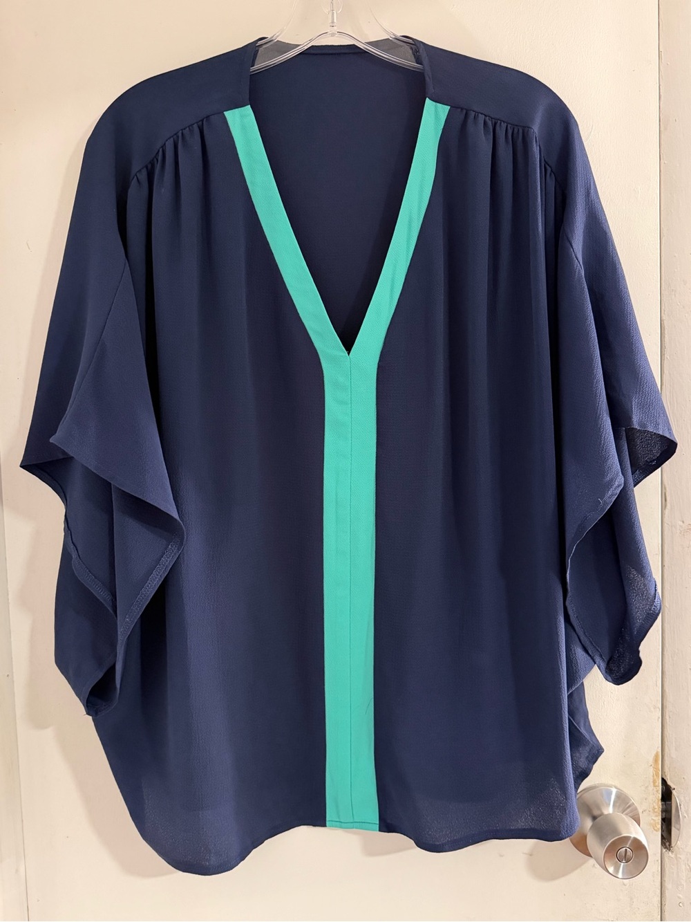 Blue colorblock blouse V-neck. Size L